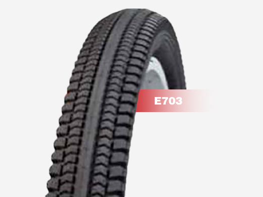 E703